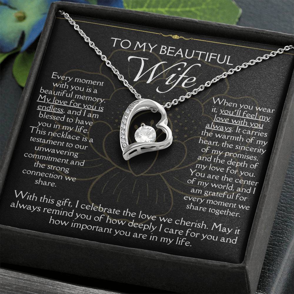 [FOR WIFE] Remind her of your endless love, Make her heart flutter, and celebrate your cherished bond with the Forever Love Necklace.